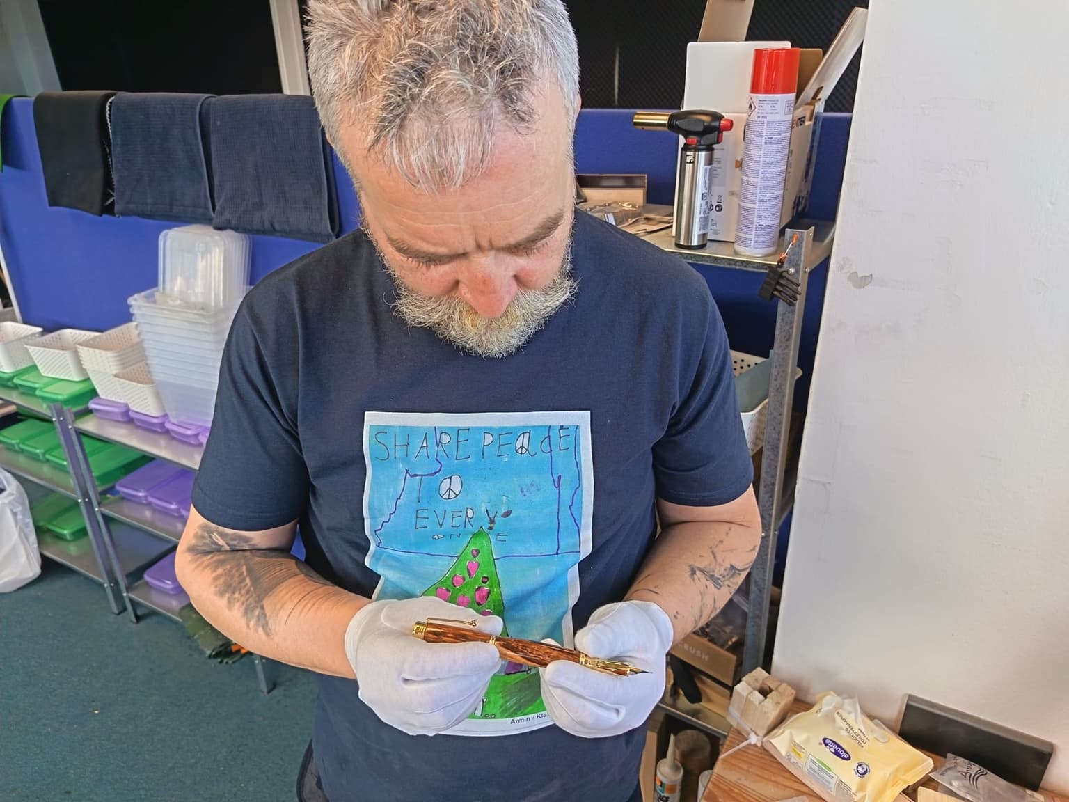 Iacob Tamas inspecting a finished LIGNORAE writing instrument